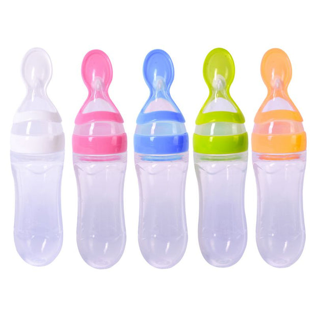 Baby Squeezing Feeding Bottle With Spoon - Plush Baby Mart