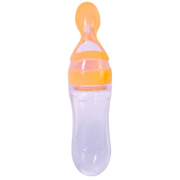 Baby Squeezing Feeding Bottle With Spoon - Plush Baby Mart